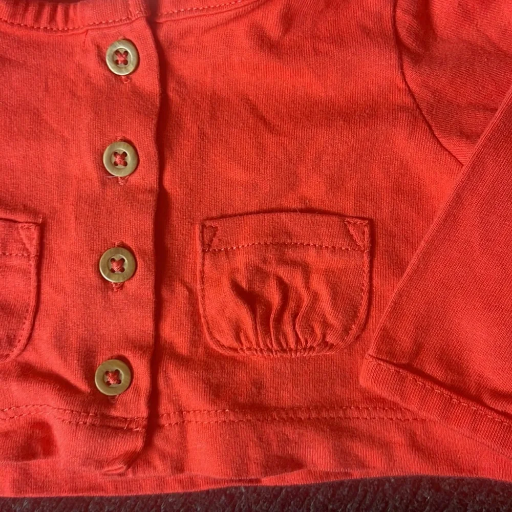 Carter’s size 3 months red long sleeve top. So cute!
